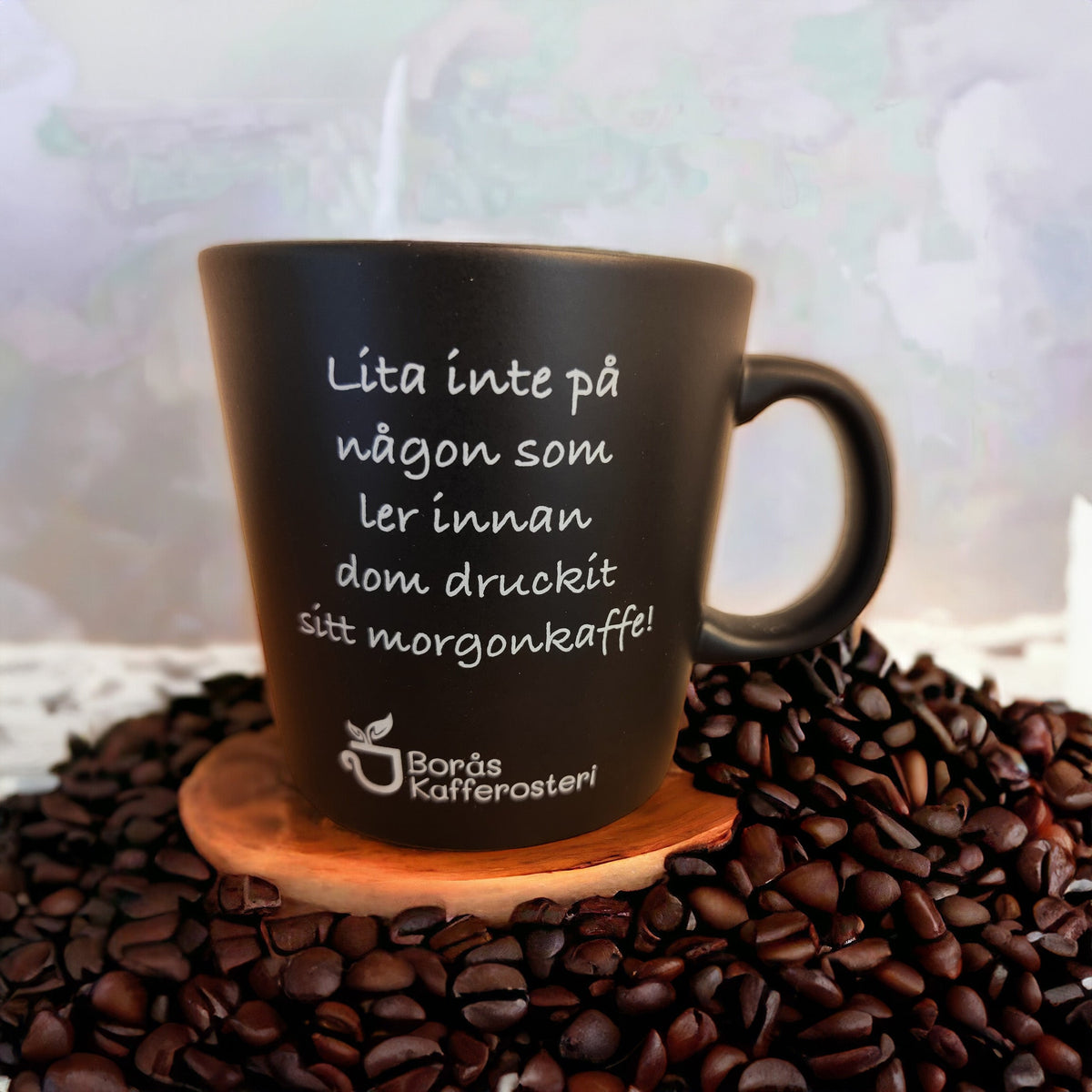 Kaffemugg med citat om morgonkaffe